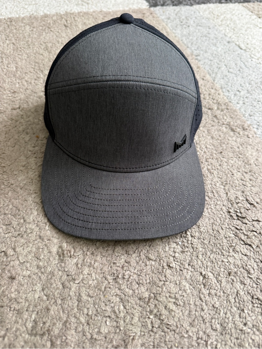 Melin Brand Gray and Black Performance Trucker Hat